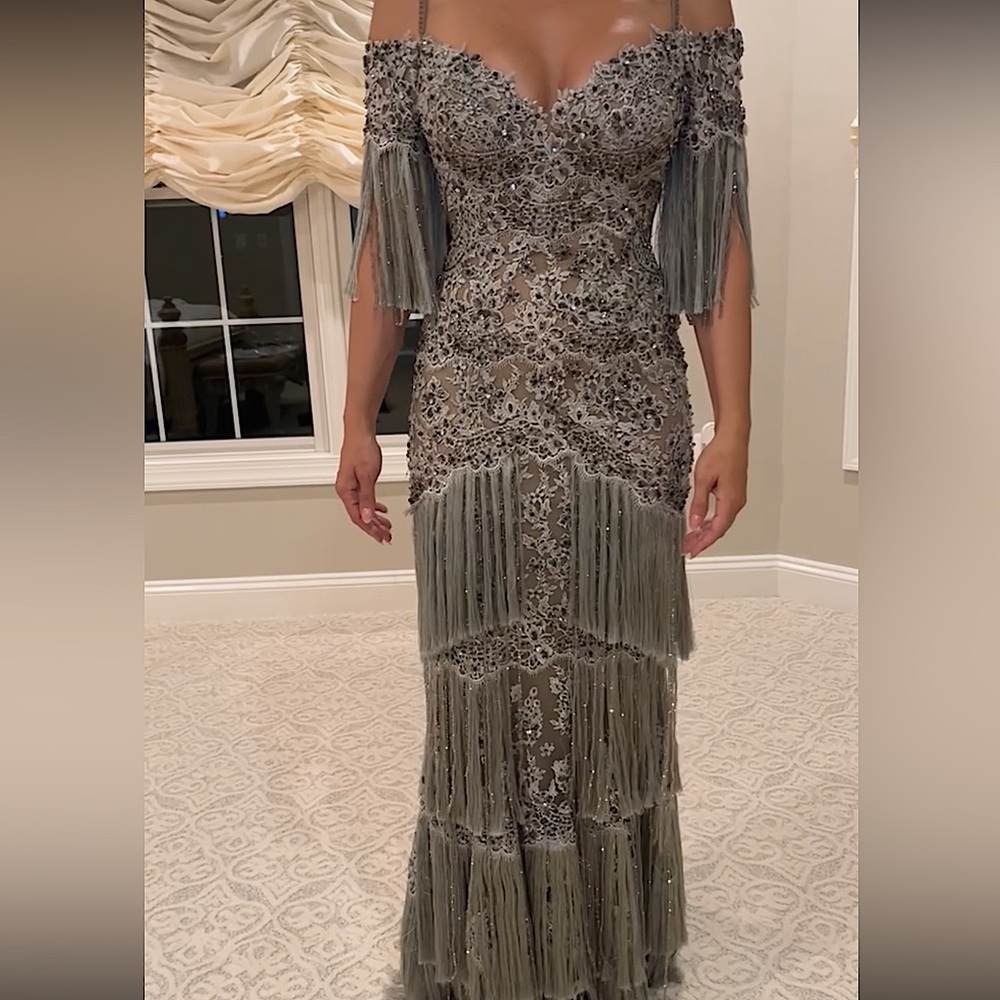 Stephen Yearick Fringe Tassel Diamond Beaded Evening Gown has lavender beading.